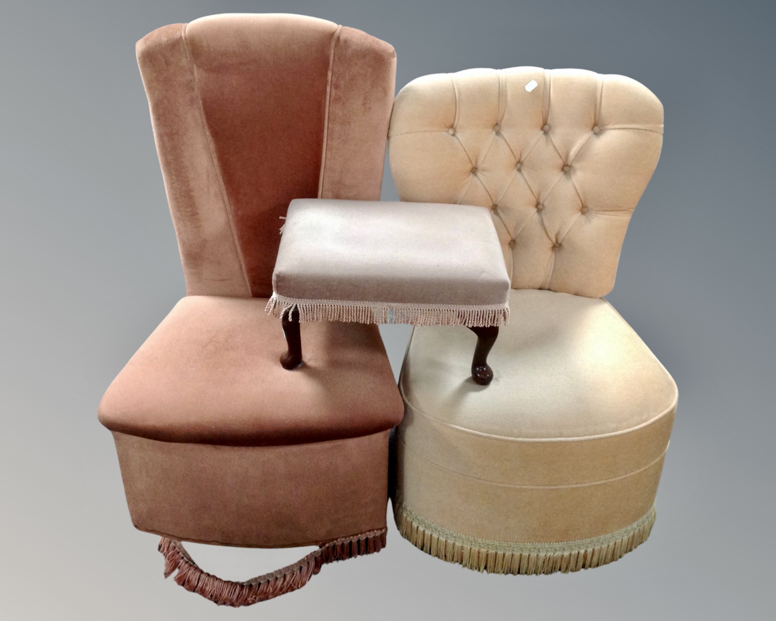 Two bedroom chairs upholstered in dralon together with a footstool.
