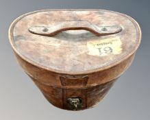 A 19th century leather top hat box initialled K. M. U.