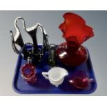 A tray of six pieces of coloured glass ware to include Davidsons glass jugs,