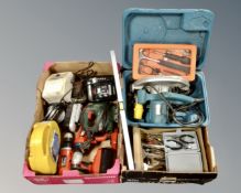 Two boxes containing a quantity of power tools including Black & Decker drills, hand tools,