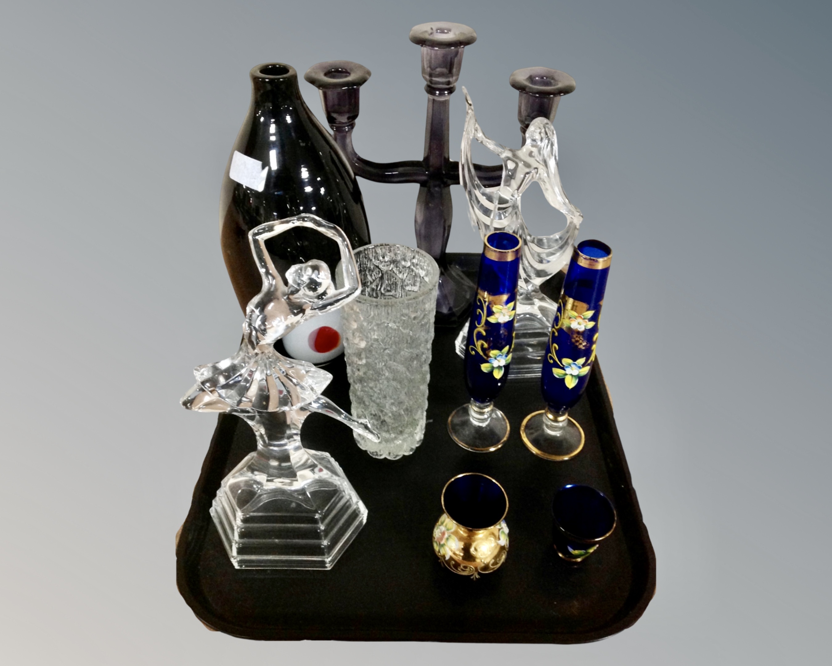 A tray of assorted glassware to include two glass figures of dancers, contemporary glass vase,