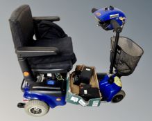 An InvaMed mobility cart, with keys, batteries and charger.