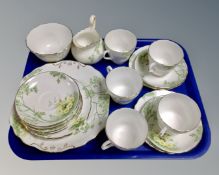 A collection of 20 pieces of Royal Chelsea floral decorated tea china.