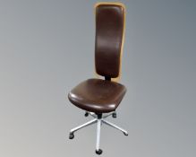 A Scandinavian high backed typist's swivel chair.