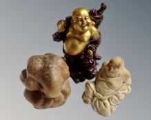 Three Buddha figures
