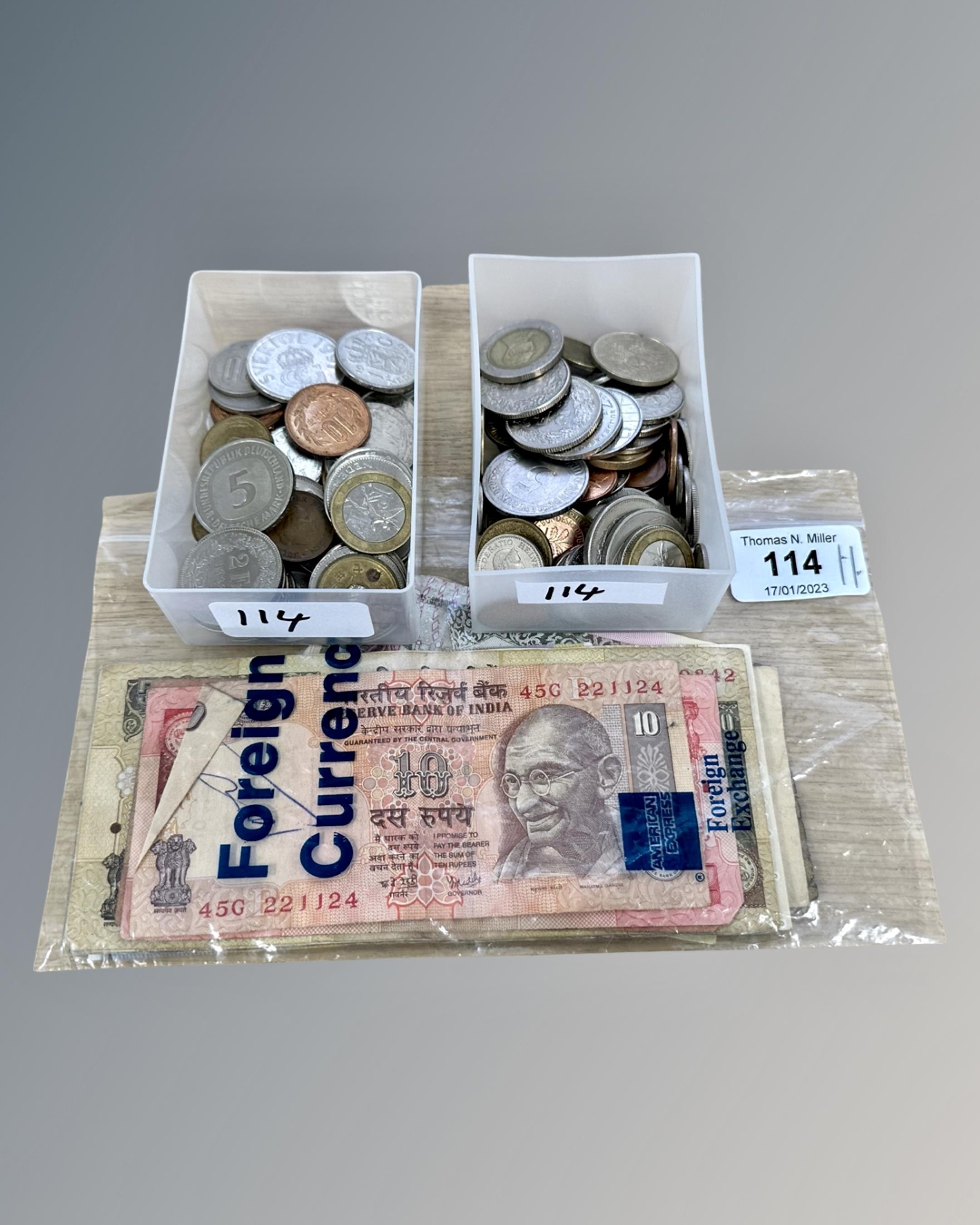 A quantity of foreign currency, both coins and twenty one bank notes - India, Denmark, Switzerland,