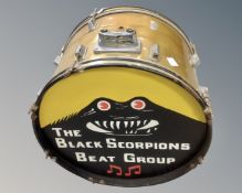 A bass drum with painted skin for 'The Black Scorpions Beat Group'.