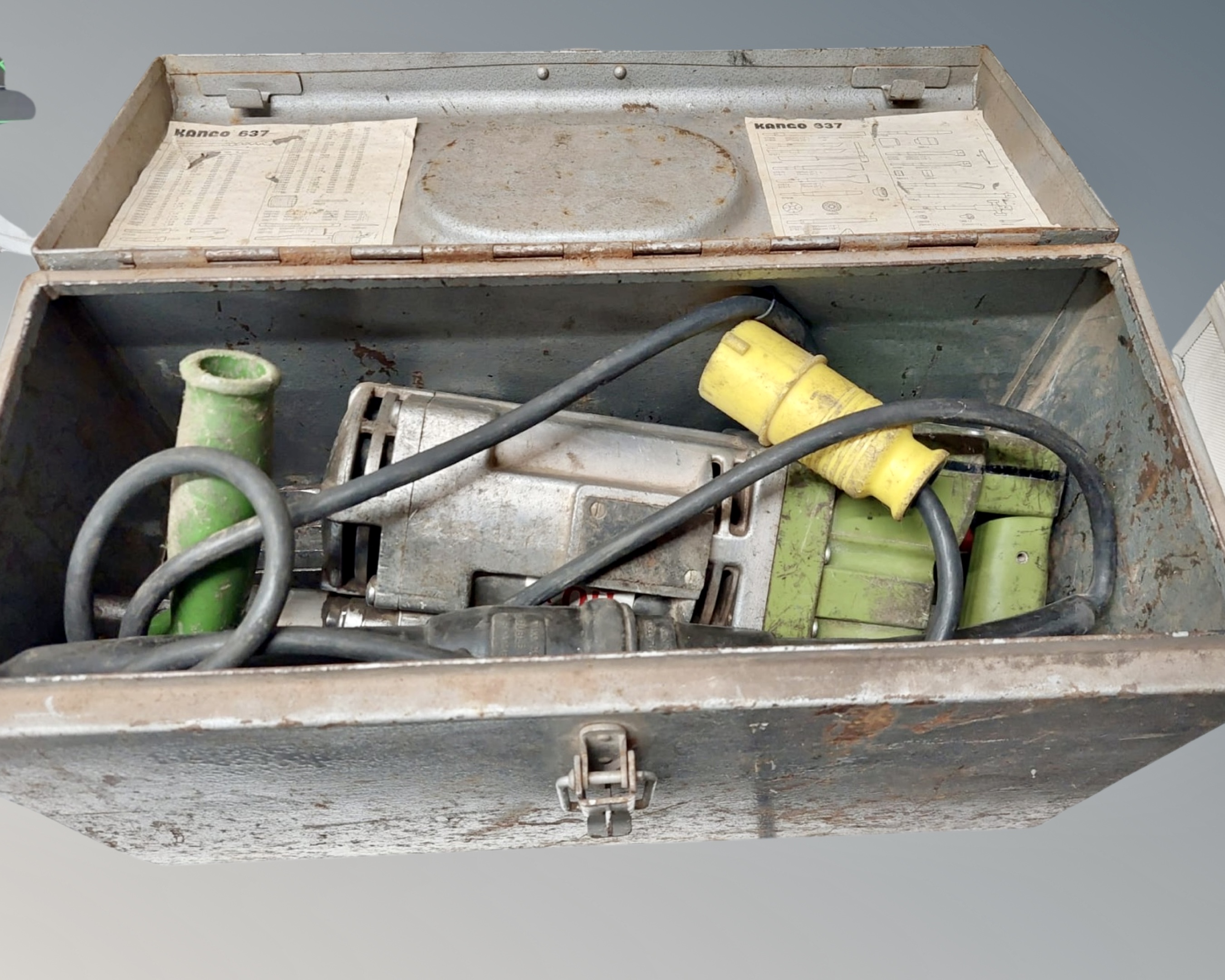 A Kango 637 jackhammer in metal case.