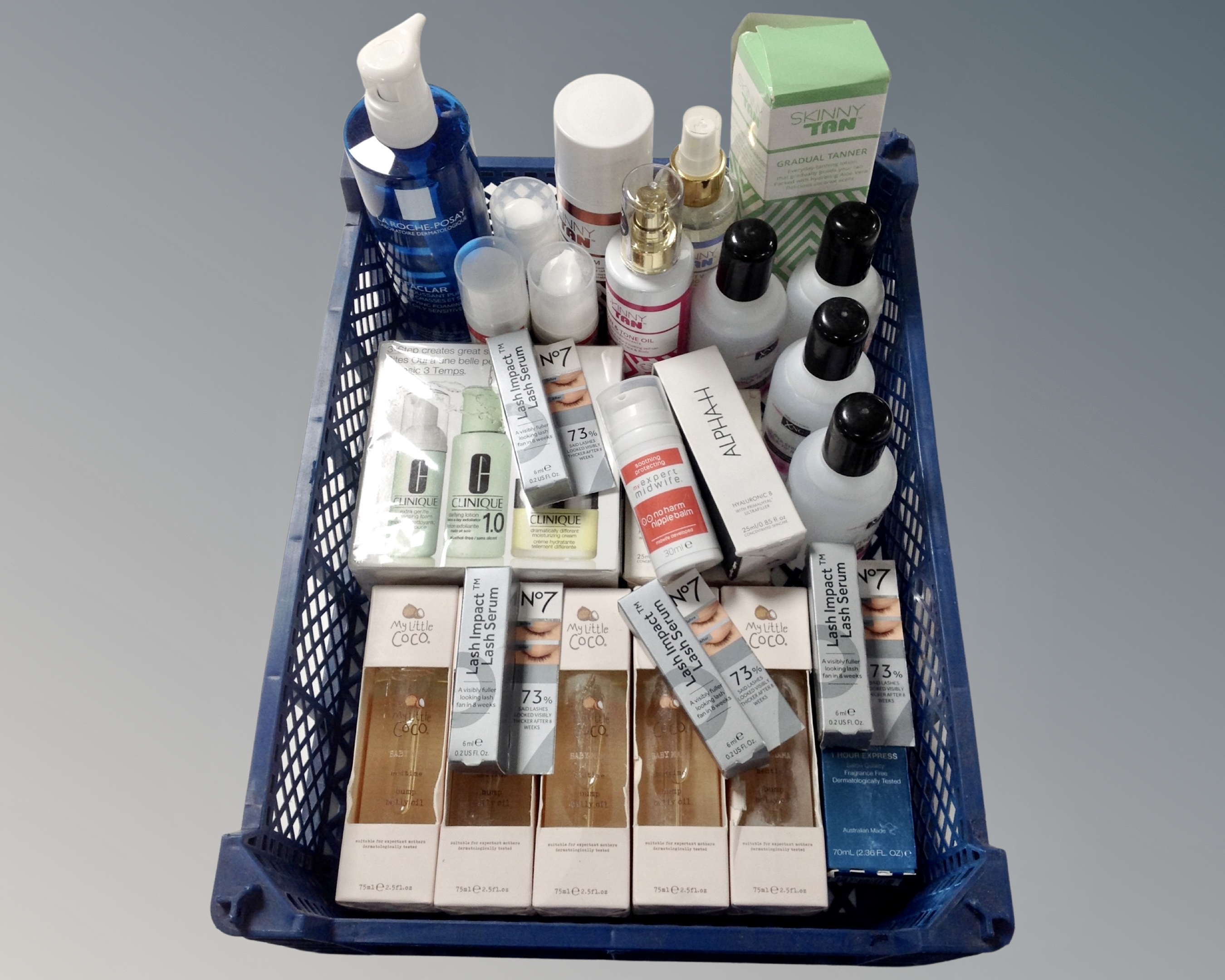 A crate of cosmetics, Number 7 Lash Serum, Tan and Tone oils, Balms, Cleansing foams,