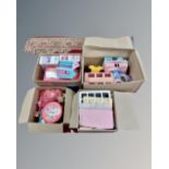 Three boxes containing a large quantity of Sindy items including buildings, figures etc.