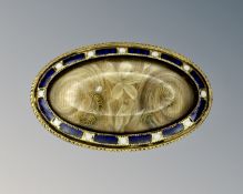A Georgian gold and enamel memorial brooch, 32 mm x 20 mm.