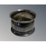 A silver napkin ring, Birmingham marks.