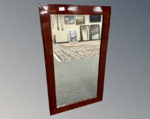 An antique beech framed mirror, 54cm by 90cm.