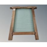 A pine and glass washboard.