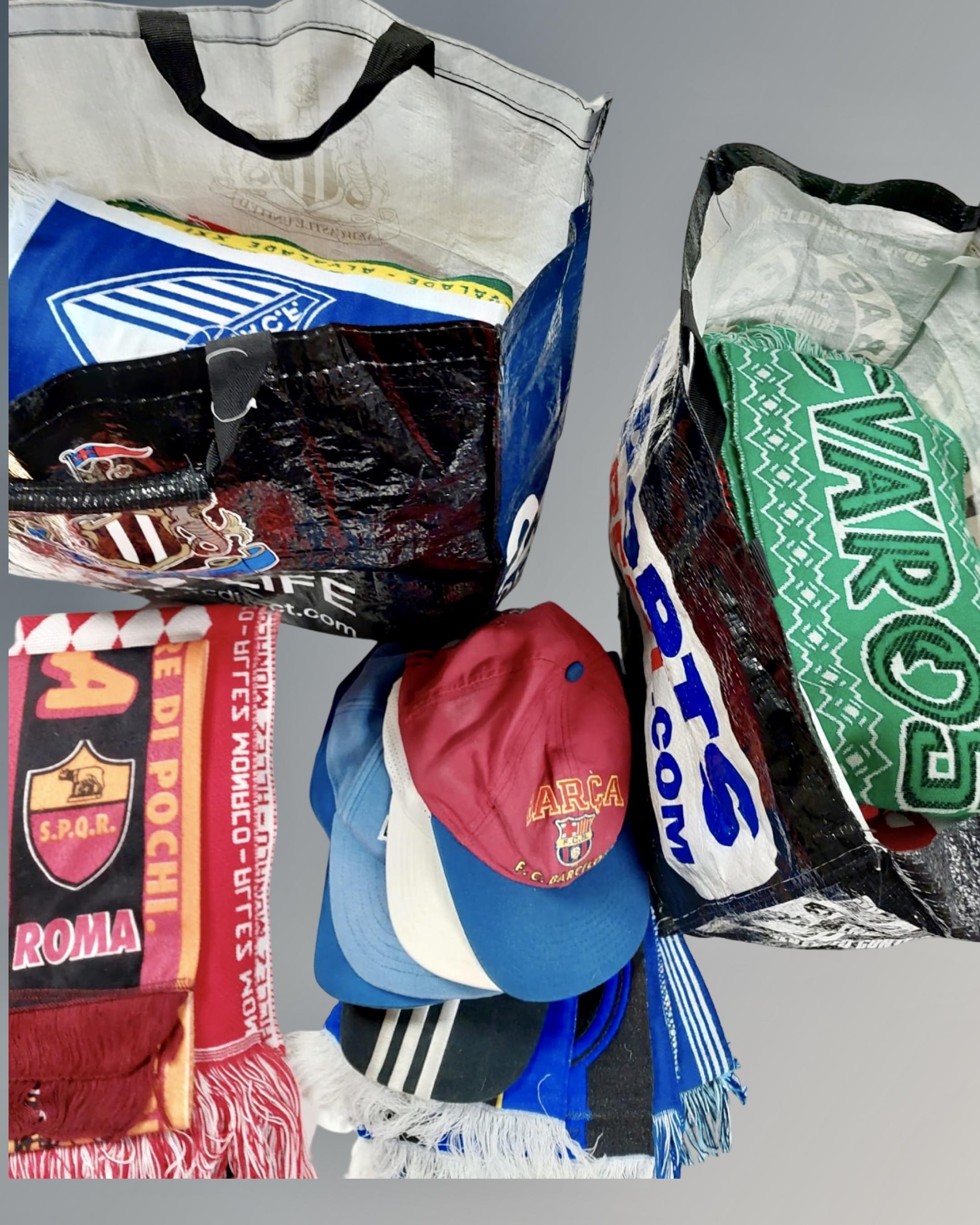 A collection of football scarves and caps.