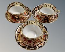 Three Royal Crown Derby Imari patterned tea cup and saucers, pattern number 2451,