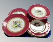 A tray containing a pair of English porcelain tazzas, with hand painted floral decoration,