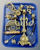 A tray containing brass three sconce candelabra, magnifying glasses,