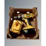 A DeWalt 18v drill with charger.
