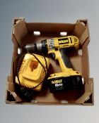 A DeWalt 18v drill with charger.