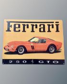 A reproduction Ferrari enamelled metal sign.