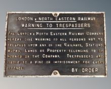 A London and North Eastern railways cast iron trespassers warning sign.