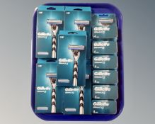 A group of five Gillette Mach III razor blades together with six boxes of replacement blades