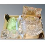 A box containing a green glass dressing table set, a pair of crystal vases,