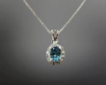 A silver blue zircon cluster pendant on chain, cluster measures 14mm by 12mm, chain length 44.5cm.
