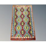 A Chobi Kilim rug, 130cm by 82cm.