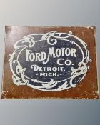 A reproduction Ford Motor Company enamelled metal sign.