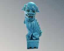 A Chinese turquoise glazed foo dog.