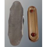 Two brass Arts and Crafts pen trays with inset hardstone cabochons together with a hammered