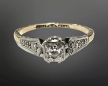 A 9ct gold and platinum diamond solitaire ring, size H. CONDITION REPORT: 1.