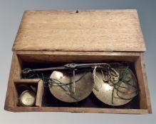 A set of 19th century postal scales in oak box