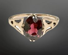 A 9ct gold single stone garnet ring, size I. CONDITION REPORT: 1.