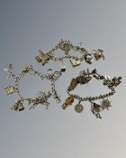 Three silver charm bracelets, 122g.