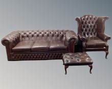 A brown button leather Chesterfield three seater settee with matching footstool and wingback