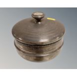 A silver circular lidded bowl with inscription S/S Cedarwood, launched at Burntisland by Mrs. J. W.