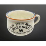 A novelty Fieldings miniature pot 'Flip Your Ashes on Old Nasty, The Violation of Poland',