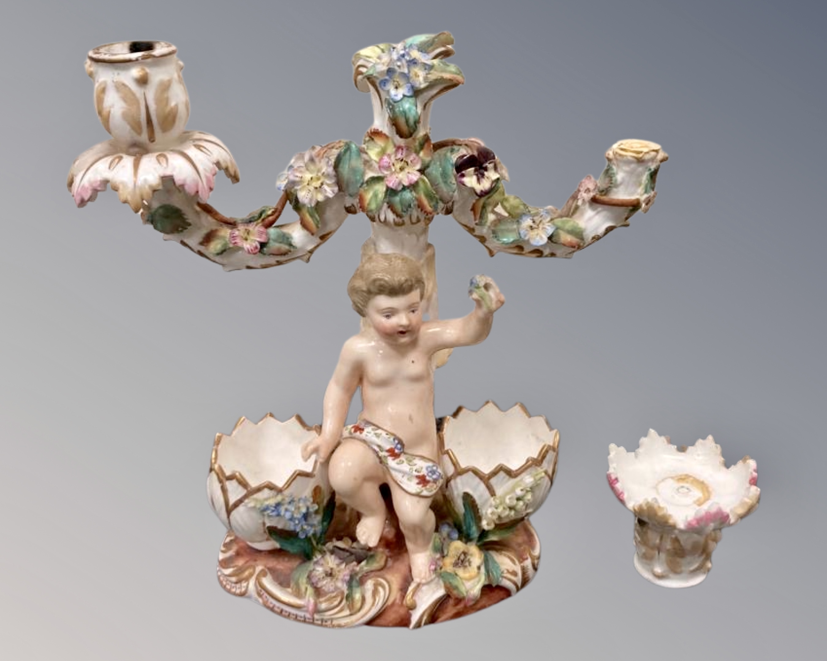 A pair of continental porcelain twin branch candelabrum decorated with putti (a/f) - Image 2 of 2