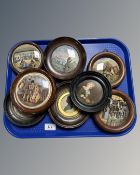 Five framed 19th century ceramic pot lids, a circular embroidery,