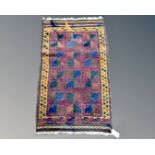 A Balouch rug, Afghanistan, 105cm by 62cm.