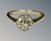 An 18ct yellow gold diamond cluster ring, size M, 2.4g.