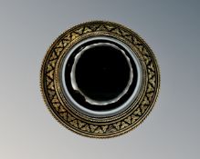 A 15ct gold black enamel memoriam brooch, diameter 30 mm.
