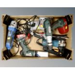 A box of power tools including Bosch Mann drills, angle grinder, circular saw,