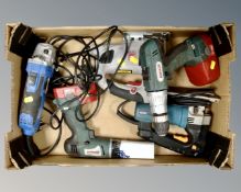 A box of power tools including Bosch Mann drills, angle grinder, circular saw,