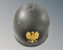 A reproduction German style helmet.