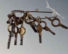 A collection of 10 brass and steel pocketwatch keys.