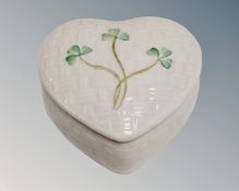 A Belleek heart shaped trinket box together with a Belleek vase.